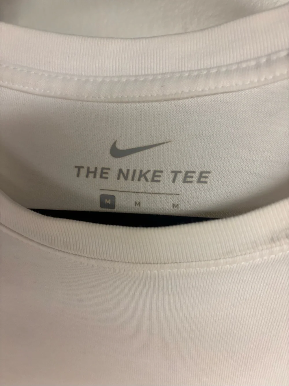 Nike White Short-Sleeve Logo Tee with Red and Gray Swoosh